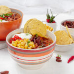 A comforting and flavorful chicken enchilada soup ready to be served.